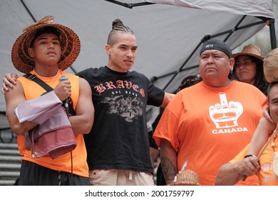 Vancouver, BC, Canada - July 1, 2021: First Nations Men Stand In Solidarity At A 