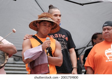 Vancouver, BC, Canada - July 1, 2021: Young man from the Squamish First Nation gives a passionate speech at a "Cancel Canada Day" rally in reflection of the Canadian Residential School System 