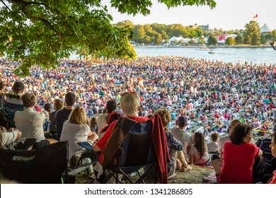 VANCOUVER, BC / CANADA – JULY 14, 2018 : Hundreds Of Vancouver Residents And Visitors Enjoy A Free Outdoor Concert Put On By The Vancouver Symphony Orchestra At Sunset Beach Park.