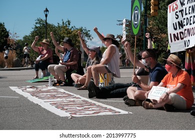 Vancouver, BC, Canada - July 24, 2021:  Activists block access to the Burrard Street Bridge at an "Extinction Rebellion" climate change protest
