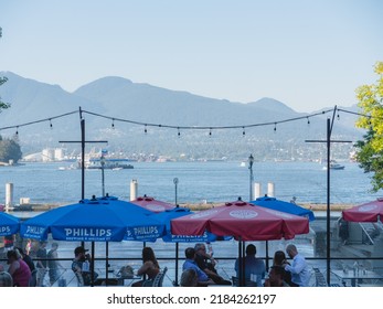 Vancouver, BC Canada - July 29, 2022: People Staying Cool While Enjoying The Summer Heatwave In Vancouver.