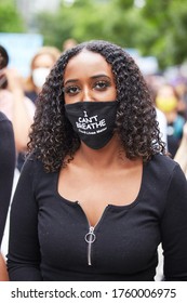 Vancouver, BC, Canada - Jun 19 2020: Portrait Of A Young Black Women With Black Face Mask And Shirt Saying 