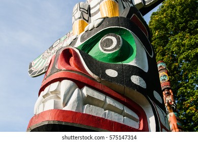 VANCOUVER BC CANADA June 20,2016 :The Totem Poles Carvings Representing Indigenous And First Nation People. Located At Brockton Point In Stanley Park, Most Visited Tourist Attraction Year Around.