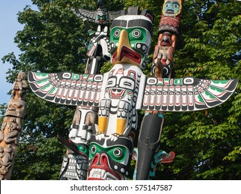 VANCOUVER BC CANADA June 20,2016 :The Totem Poles Carvings Representing Indigenous And First Nation People. Located At Brockton Point In Stanley Park, Most Visited Tourist Attraction Year Around.