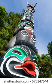 VANCOUVER BC CANADA June 20,2016 :The Totem Poles Carvings Representing Indigenous And First Nation People. Located At Brockton Point In Stanley Park, Most Visited Tourist Attraction Year Around.