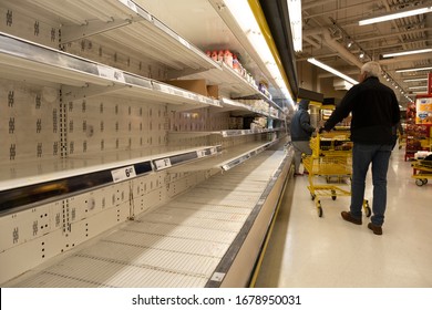 VANCOUVER, BC, CANADA - MAR 20, 2020: Shelf At A Supermarket Mostly Empty Amid Panic Buying As The Coronavirus Spreads.