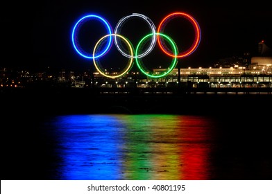 VANCOUVER, BC, CANADA - NOVEMBER 11: Vancouver 2010 Winter Olympic Games Rings shine on November 11, 2009 at Burrard Inlet, Vancouver, BC.