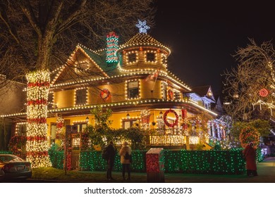 Vancouver BC Canada November 2020: People Are Watching And Enjoy The Best Christmas Lights Decoration House And Light Display In Vancouver Downtown At 995 Bute St. And 1203 Nelson St. Rand House