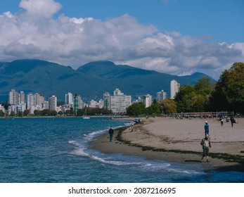 Vancouver, BC Canada - October 11, 2021. Sunny Autumn Day In Vancouver At Kitsilano Beach People Walking.