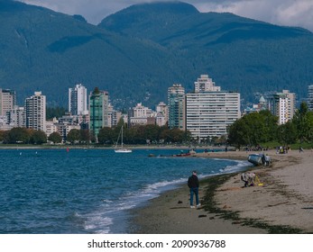 Vancouver, BC Canada - October 11, 2021. Sunny Autumn Day In Vancouver At Kitsilano Beach People Walking.