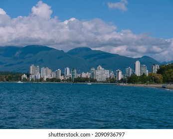 Vancouver, BC Canada - October 11, 2021. Sunny Autumn Day In Vancouver At Kitsilano Beach People Walking.