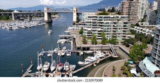 Vancouver BC, Canada, October 21, 2021: Landscape view of marina, boats and False Creek from the Burrard Street Bridge.