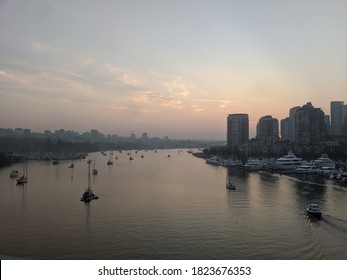 Vancouver, BC / Canada - September 11 2020: Smokey Skies Over Vancouver BC From Wildfires In Washington. Photograph Taken At Sunset Shows The Cityscape From Cambie Street Bridge And False Creek. 