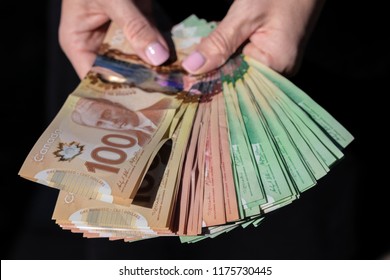 Vancouver, BC / Canada - September 8th 2018 : A Hand Holding A Bunch Of Canadian Cash