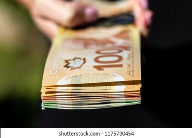 Vancouver, BC / Canada - September 8th 2018 : A Hand Holding A Bunch Of Canadian Cash