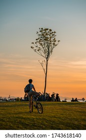 Vancouver BC Canada,April 2020.group Of People Sitting Together On Beach With Sunset Backgrounds During The Covid_19
