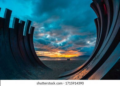 Vancouver BC Canada,April 2020.Whale Ribs Sculpture On The Beach With Sunset Sky Backgrounds