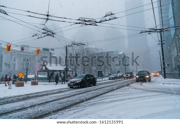 Vancouver BC Canada,February 2019.Vancouver\
downtown with snow fall\
backgrounds