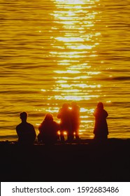 Vancouver BC Canada,June 2019.silhouette Of People On Beach With Sunset Backgrounds