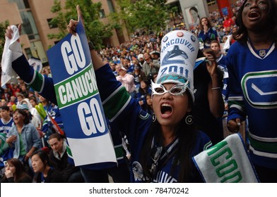 VANCOUVER, BC,CANADA - JUNE 1: Vancouver Canucks Fans Watch The Stanley Cup 2011 Finals Game 1 Win Over Boston Bruins On June 1, 2011 In Vancouver, Canada