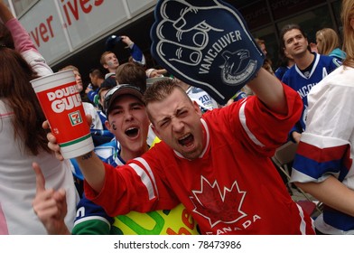 VANCOUVER, BC,CANADA - JUNE 1: Vancouver Canucks Fans React To The Stanley Cup 2011 Finals Game 1 Win Over Boston Bruins On June 1, 2011 In Vancouver, Canada