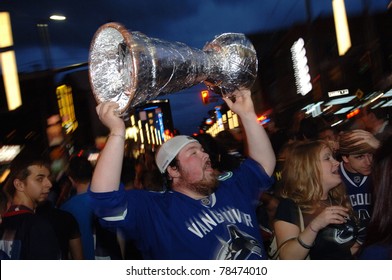 VANCOUVER, BC,CANADA - JUNE 1: Vancouver Canucks Fans React To The Stanley Cup 2011 Finals Game 1 Win Over Boston Bruins On June 1, 2011 In Vancouver, Canada