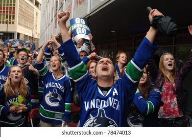 VANCOUVER, BC,CANADA - JUNE 1: Vancouver Canucks Fans React To The Stanley Cup 2011 Finals Game 1 Win Over Boston Bruins On June 1, 2011 In Vancouver, Canada