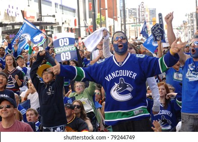 VANCOUVER, BC,CANADA - JUNE 10: Vancouver Canucks Fans Watch The Stanley Cup 2011 Finals Game 5 Vancouver Canucks Vs. Boston Bruins On June 10, 2011 In Downtown Vancouver, Canada