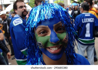 VANCOUVER, BC,CANADA - JUNE 13, 2011: Vancouver Canucks Fans Watch The Stanley Cup 2011 Finals Game 6 Vancouver Canucks Vs. Boston Bruins On June 13, 2011 In Downtown Vancouver, Canada