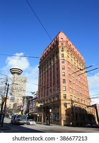 Vancouver, British Columbia, Canada - March 5, 2016: Dominion Building Was The Tallest Commercial Building In The British Empire Upon Its Completion In 1910. Harbour Centre Is In The Background.