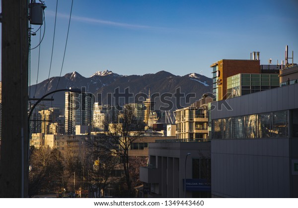 VANCOUVER, BRITISH\
COLUMBIA, CANADA - MARCH 18, 2019: Harbour Center can been seen\
from a distance. The skyscraper is know for the \'lookout\' tower\
atop the office building\

