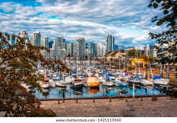 Vancouver, British Columbia /\
Canada - September 24th 2018: View of Vancouver skyline and False\
Creek in autumn, Vancouver, British Columbia, Canada, North\
America