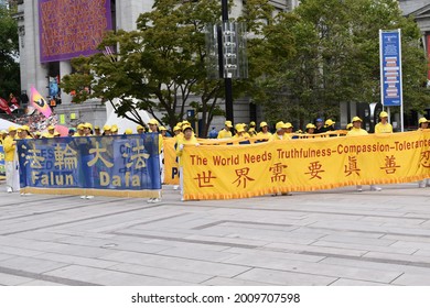 Vancouver, British Columbia, Canada-July 17, 2021:  Demonstrators For Stopping The Persecution Of FalunGong In China Holding A Sign That The World Needs Truthfulness, Compassion, And Tolerance.