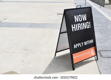 Vancouver, British Columbia, Canada-July 17, 2021:  Now Hiring Sign For Browns Social Club Restaurant At The Queen Elizabeth Theatre.