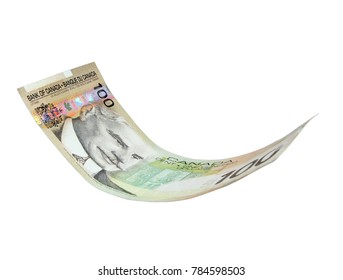 Vancouver, Canada: 16 July 2011: Canadian dollar bills presented as flying in the air, isolated on white background