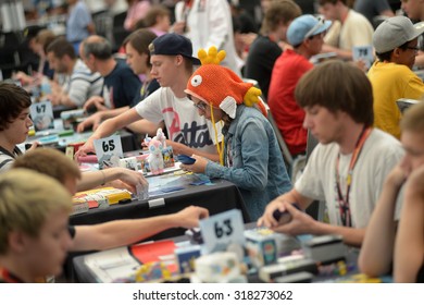 VANCOUVER, CANADA - AUGUST 10, 2013: Players compete during local Pokemon video games tournament in Vancouver, Canada, August 10, 2013.