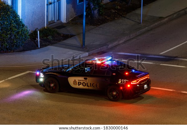 Vancouver, Canada - Circa 2020 : Vancouver\
Police Cruiser with lights\
flashing