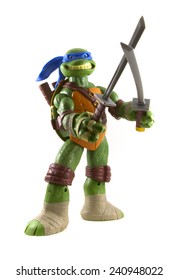 VANCOUVER, CANADA - DECEMBER 30, 2014 A Teenage Mutant Ninja Turtles toy isolated on white. They were made popular in the 80's and 90's and expanded into a cartoon series, films, video games and toys.