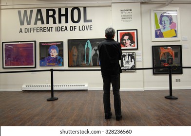 VANCOUVER, CANADA - FEBRUARY 27, 2015: Visitors attend the biggest in Canada exhibition of works of pop art legend Andy Warhol in Yaletown warehouse in Vancouver, Canada, Feb.27, 2015.