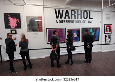 VANCOUVER, CANADA - FEBRUARY 27, 2015: Visitors attend the biggest in Canada exhibition of works of pop art legend Andy Warhol in Yaletown warehouse in Vancouver, Canada, Feb.27, 2015.