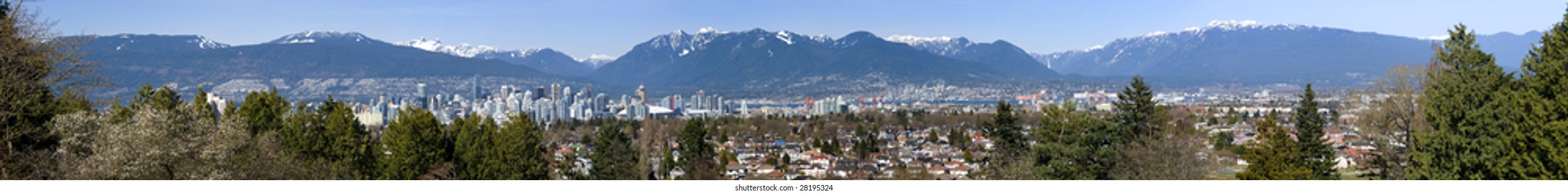 Vancouver, Canada Flanked By The North Shore Mountains.