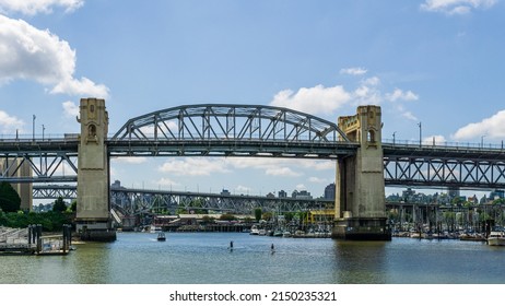 VANCOUVER, CANADA - JUNE 17, 2020: The famous Burrard Street Bridge sunny summer day.