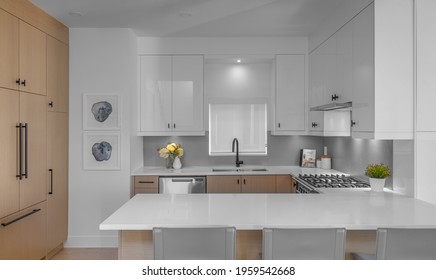 VANCOUVER, CANADA - Mar 11, 2020: A Presale Duplex Unit Located In Vancouver, Canada  A Modern Interior Designed Kitchen That Shows Symmetry And Dividing Lines 