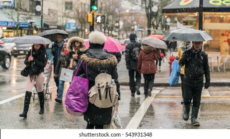 Vancouver Canada,December 26 2016,Boxing Day Shopping With Rain Snow Backgrounds,Robson St,Vancouver Canada