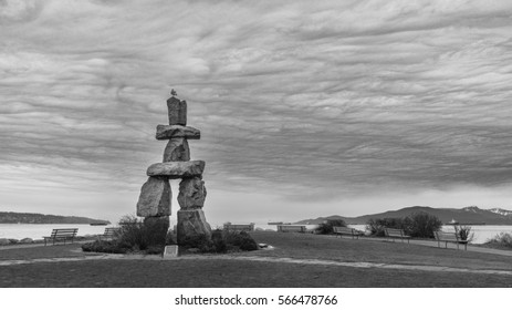 Vancouver Canada,January 2017.Inukshuk With Clouds Sky Backgrounds