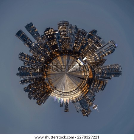 Vancouver City, British Columbia, Canada - 360 degree panorama forming a tiny planet. Downtown buildings seen from Stanley Park in the evening