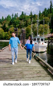 Vancouver Island, Canada, Quadra Island Old Harbor With Fishing Boat At Cape Mudge, A Couple On Vacation At Vancouver Island. Canada