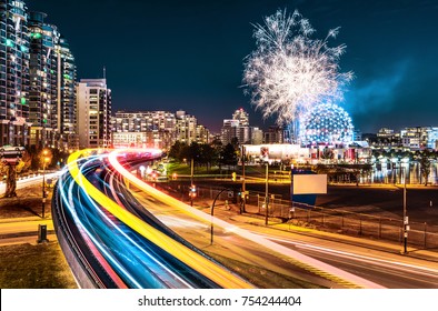 Vancouver Sky Train Fireworks Over The Night City Skyline.