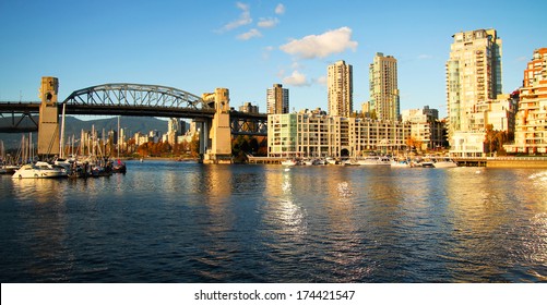 Vancouver Skyline And The Bridge By A Nice Sunny Day