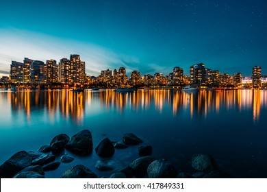 Vancouver skyline reflection at sunset